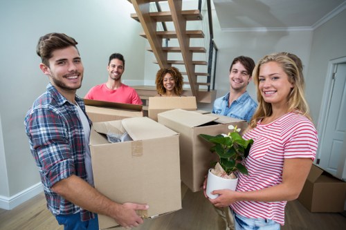 Removal team preparing furniture and equipment safely before a move