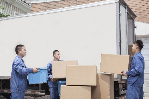 Stockwell removal company team loading furniture into a moving van