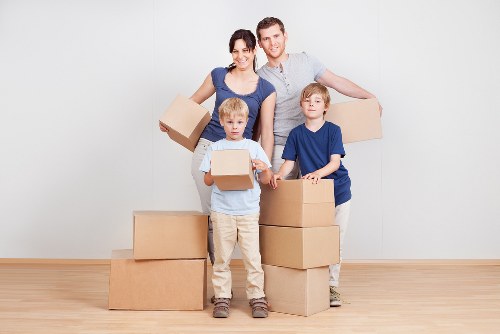 Removal van and boxes outside a South London property