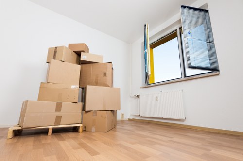 Professional movers handling furniture in Stockwell
