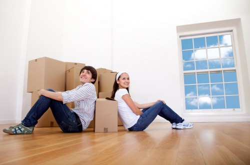 Local movers loading a van for a Stockwell household relocation